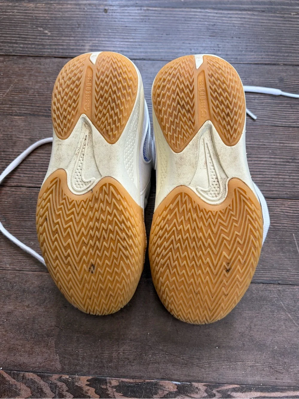 Nike White Basketball Sneakers with Orange Accents and Gum Sole